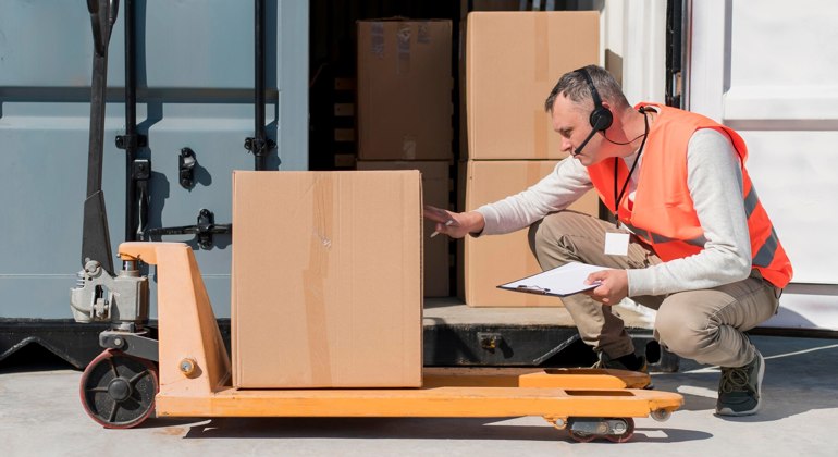 Full Shot Man With Pallet Truck