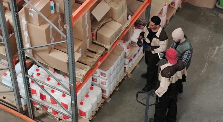 Warehouse Workers and Pallet Truck