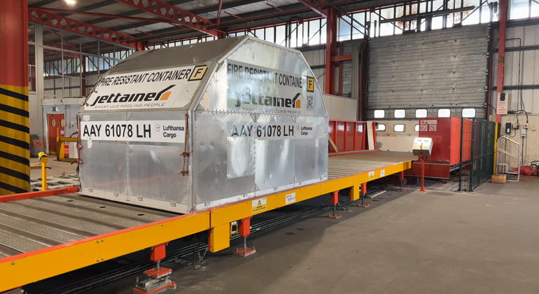 ULD Moving Along Powered Rollerbed (1)