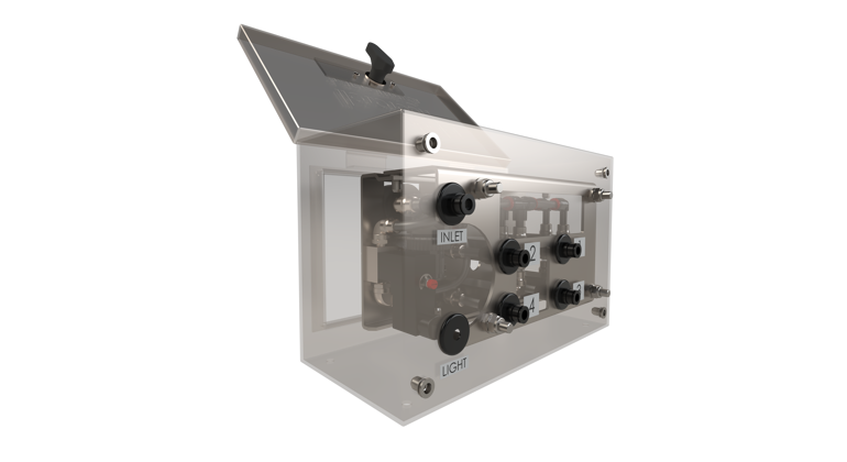 Pneumatic control box with transparent sides with internal components viewable which control a rollertrack loading system