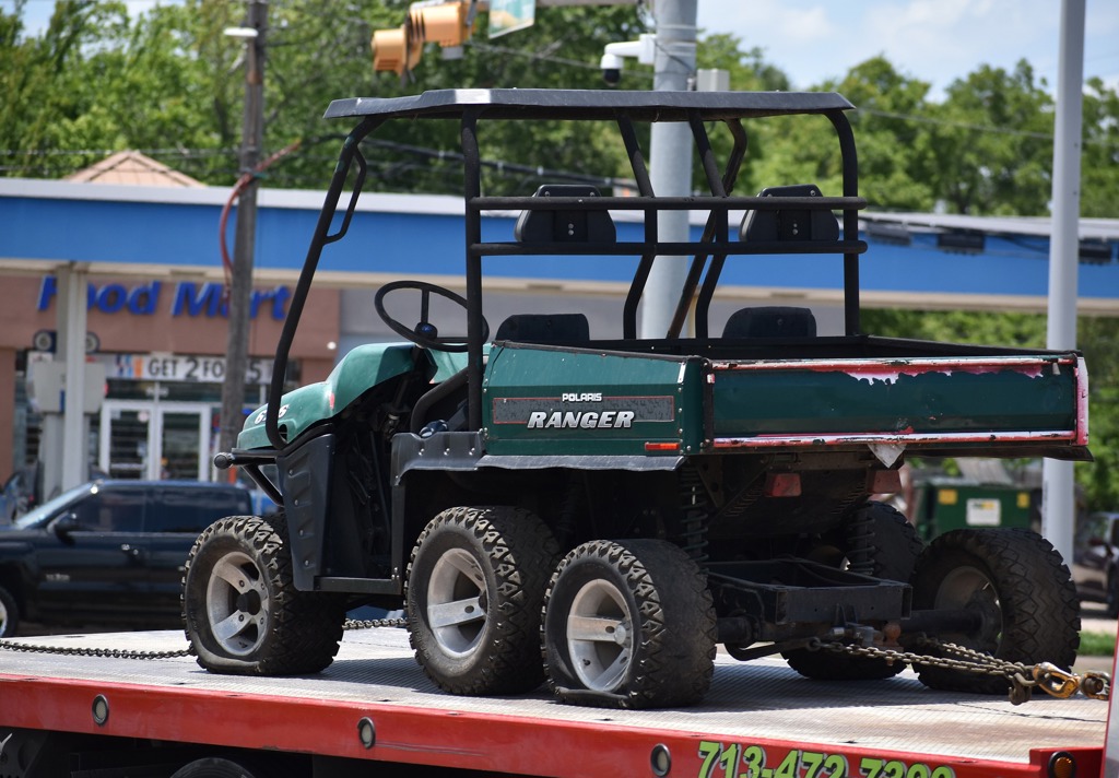 A unique load secured to a flatbed truck trailer, ready to be transported and then safely unloaded at its destination